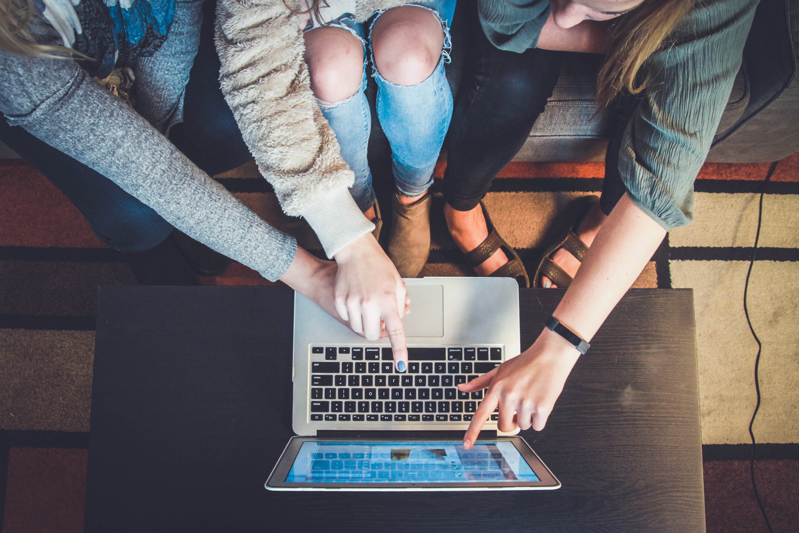 Three people working together